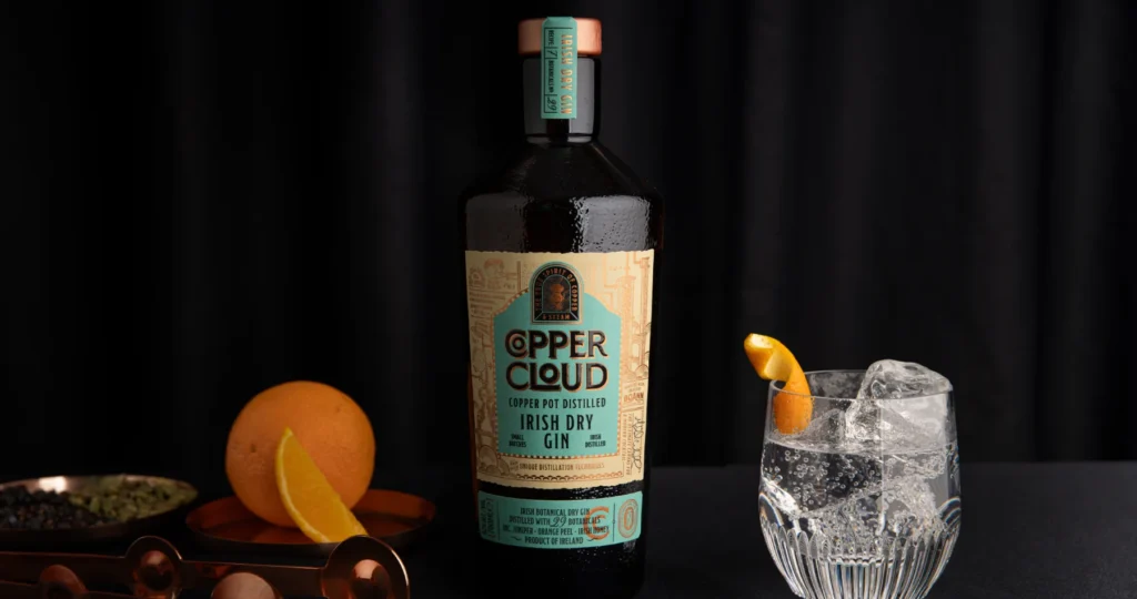 copper irish dry gin with glass and orange