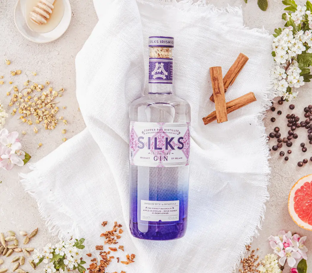 silks gin botles on table cloth